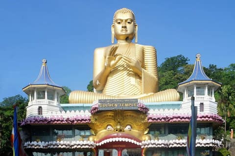 The large golden Buddha above the entrance to the Dambulla cave temple