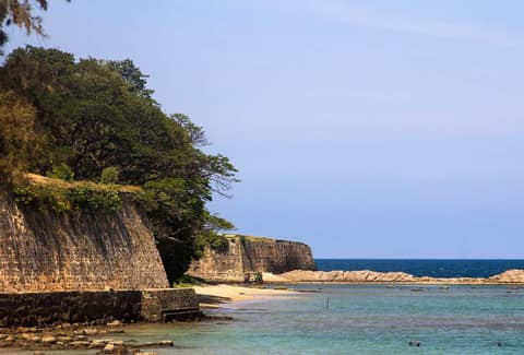 Old fort walls above a sheltered bay at Trincomalee